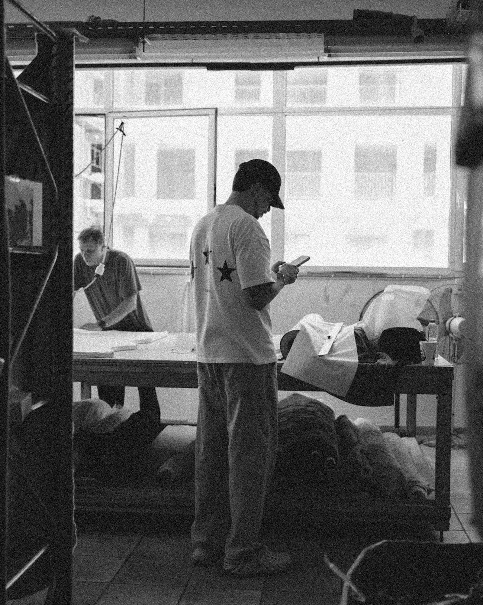 Black-and-white backstage photograph from the Complice Athens workshop